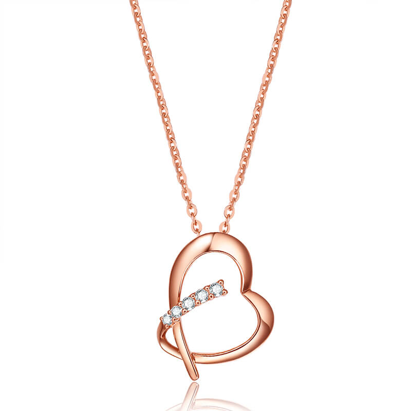  Heart-shaped cluster-set pendant.